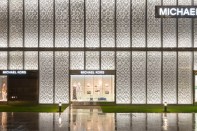 Narrow optic wall grazers are located at the top and
bottom of each panel and are coordinated with the reflector angles to create a
sense of depth using a pattern of light and shadows across the façade.