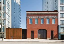 Berman, who also worked on the entry building at nearby MoMA PS1, reconfigured the center’s side lot entrance into a layered spatial procession by creating a courtyard and lobby behind a wall of Cor-Ten steel.