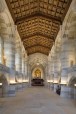 A view of the nave looking toward the mural Alma Mater.