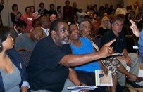 Detroit resident Raynard Davis confronts then-Mayor Dave Bing at a 2010 community forum to discuss the Detroit Works plan. “Why are you talking about shrinking the city instead of growing the city?” Davis asked.
