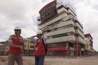 Degenkolb engineer Gordy Wray and Perkins Eastman architect Stephen Forneris prepare to assess building conditions in Portoviejo, Ecuador, after the April 16, 2016, earthquake.