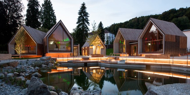 Parkhotel Jordanbad's sauna village includes (l to r): the infusion sauna, a shower facility, the fireplace sauna, and the herbal sauna.