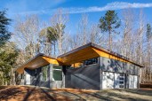 In form, function, and materials, this compact house is decidedly modern.