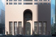 The updated renderings show clear glazing and a refreshed central arch.