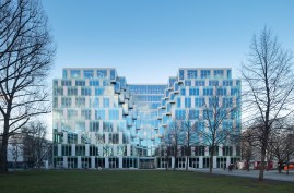 Sitting directly on Hermann-Stöhr-Platz, UP! adds two floors plus a roof pavilion and rooftop terrace with underground parking for 100 cars