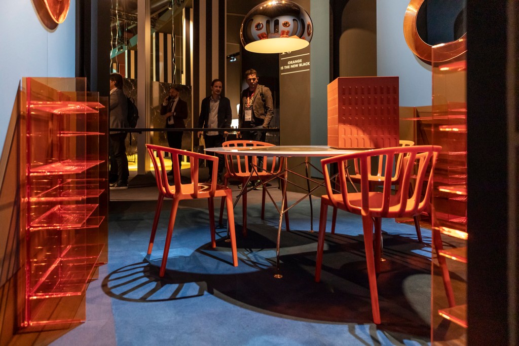 A molded-plastic model of Aldo Rossi’s unfinished San Cataldo Cemetery in Modena, Italy, sits in a vignette in the Kartell booth.