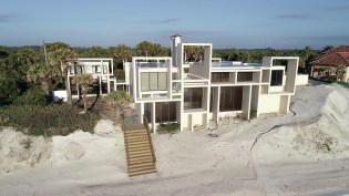 The Milam Residence was completed in 1962 with four bedrooms and four bathrooms.