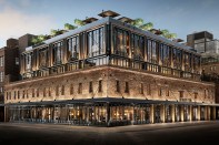 The new construction enhances RH New York's historic facade. Two disparate elements are made harmonious with the use of warm color temperature lighting both inside and out.