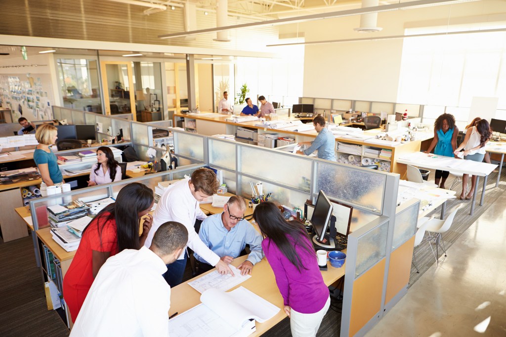 Interior Of Busy Modern Open Plan Office
