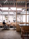 Windows in the restaurant offer views into the skylit fermentation hall and brew house.