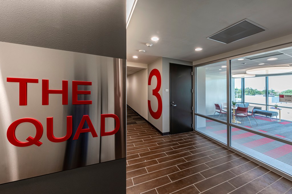 Clear wayfinding graphics at elevator lobby with natural light from adjacent and highly transparent study spaces. Courtesy EYP Architecture & Engineering.
