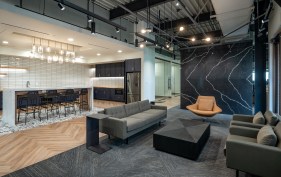 The public-facing part of the office comprises reception, large conference room, video production room, lounge, galley kitchen, and outdoor patio.