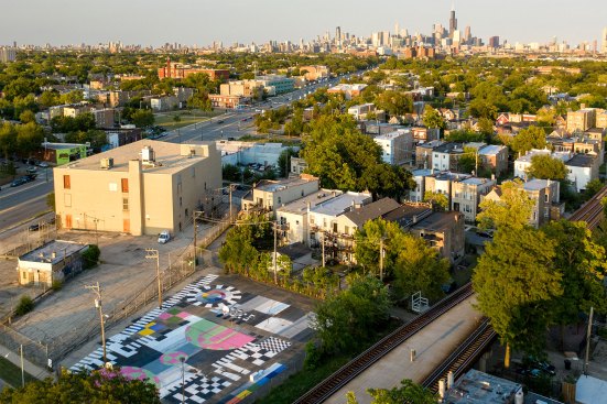 Outpost Office used a GPS-guided robot to paint the Cover the Grid mural in five days.