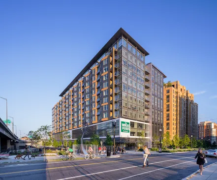 North façade against the elevated Rte 395.