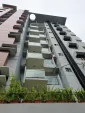 Over hanging transparent Balcony with visual access to Local Environment.
