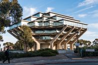 The textured and patterned site-cast tilt-up concrete walls of the East Campus Office Building at the University of California San Diego appear almost as an extension of the canyon geology. Tilt-up construction allowed campus workers to move into the building less than a year after construction began.