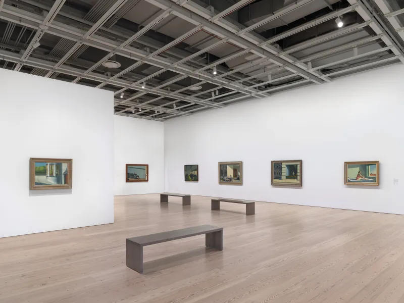 Installation view of Edward Hopper’s New York (Whitney Museum of American Art, New York, October 19, 2022- March 5, 2023). From left to right: August in the City, 1945; Intermission, 1963; Chair Car, 1965; Sunlight in a Cafeteria, 1958; New York Office, 1962; Morning Sun, 1952.