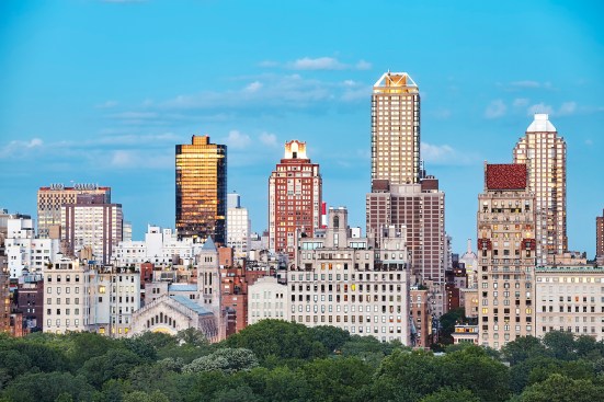 New York City skyline over the Central Park at sunset, USA.