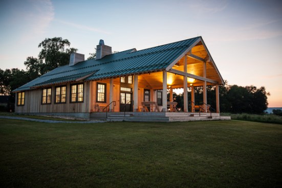 East-facing porch affords spectacular views of the farm and lakes and will serve as an outdoor classroom and an event space