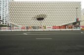 The Broad's façade lifts at its Grand Avenue corners to allow entrance into the building.