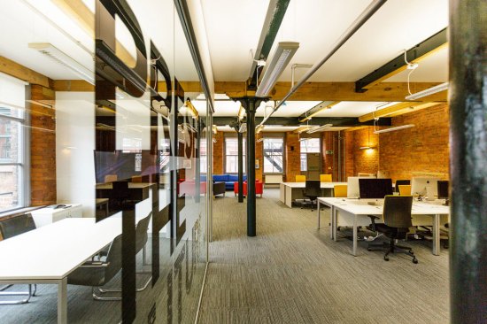 Interior profile extending length of office space at Buffalo 7, Manchester, UK