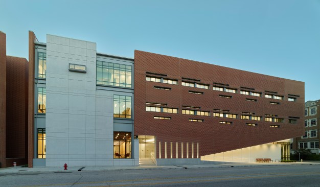 West elevation at dusk.