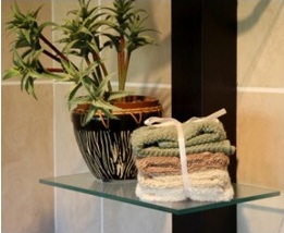 glass shelf installed in bathroom