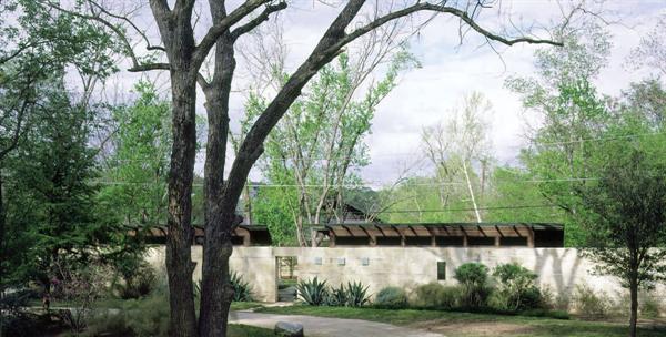 An unassuming entry wall leads to the Project of the Year, by Lake Flato Architects.