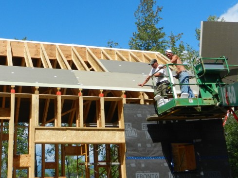 Figure 9. A double layer of 3-inch rigid polyisocyanurate insulation (with offsetting seams) was installed over the roof framing.