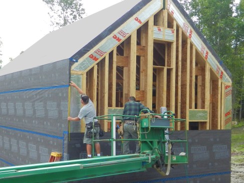 Figure 10. The Humida WRB was run up walls and over the roof plane. Rigid polyiso was fit into the I-joist flanges for a little more insulation.