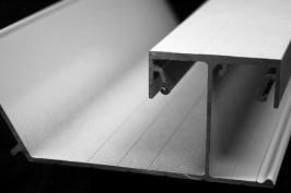 Dry Joist EZ has only two SKUs: an 8" main board and the 4" multi board pictured here, which is an all-in-one start board, finish board, and railing mount. Flashing receivers and cut lines are extruded into the multi board.