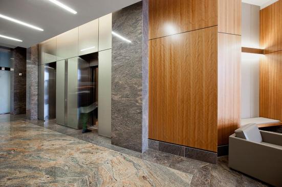 LEVELe Wall System with Blind panels in ViviChrome Chromis glass with custom color interlayer and Opalex finish at Mission City Corporate Center, San Diego, California