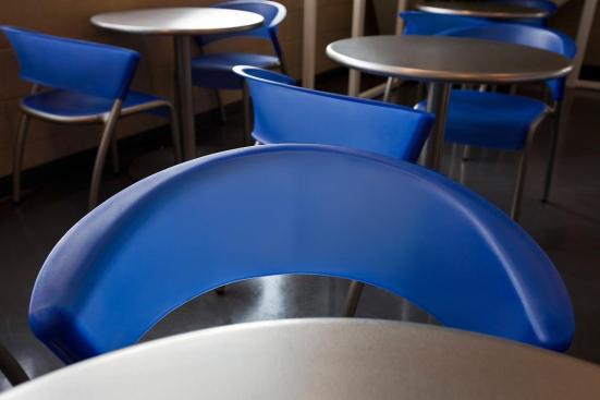Bantam Chairs shown in Blueberry and Column Tables with Table Tops in Stainless Steel with Sandstone finish at University of California - Davis, Davis, California
