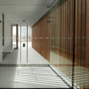 The+main+entrance+provides+views+through+the+building+%22+title%3d+%22The+main+entrance+provides+views+through+the+building