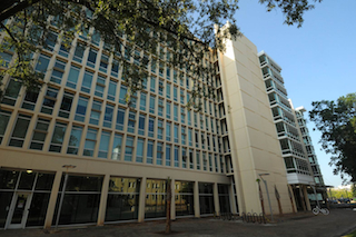 The nine-story residence hall's traditional dormitory-style rooms were converted to 280 suite-style units
