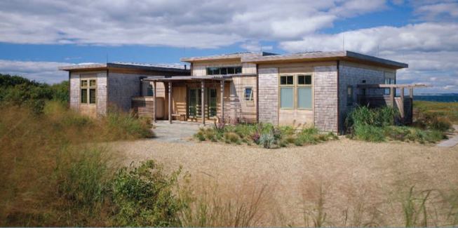 The building sits low to the earth, with no steps greater than 4 inches.