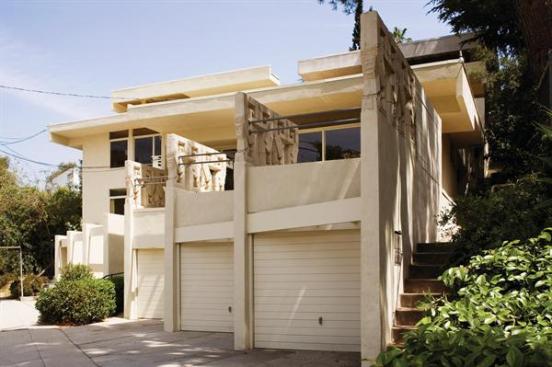 The restored exterior with original sculptural screens by artist Gordon Newell.