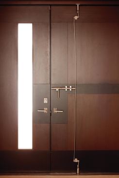A glass slot gives the occupants a preview of who might be at the door.