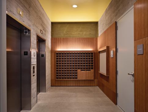 Wood mailboxes by elevator