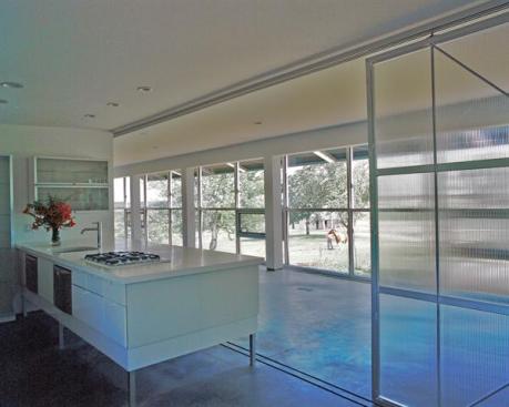 A radiant in floor heating system picks up the slack on cloudy days.