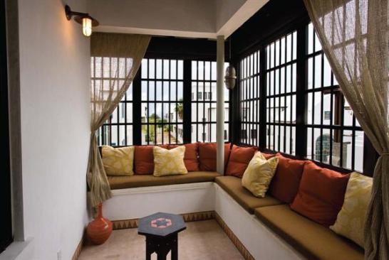 Located off the master bedroom, the second-floor loggia offers views of the Gulf of Mexico.