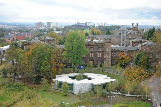 Rem Koolhaas's first of two buildings on this year's shortlist is Maggie's Centre located in Gartnavel, Glasgow. The building, a cancer center, is shaped like a doughnut with a courtyard in the middle.