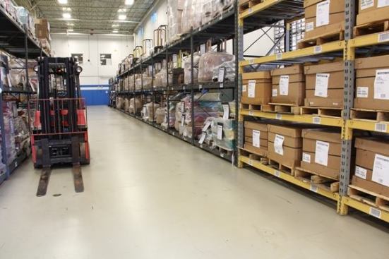 Many of the components produced in this plant are sent elsewhere for intermediate and/or final processing. Heat treating and plating are done somewhere else, as is the application of handles and final packaging. The components on these racks have just come back from somewhere or are staged and about to go out.