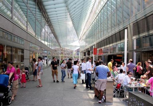 The+arcade+serves+as+a+passageway%2c+destination%2c+and+meeting+place.