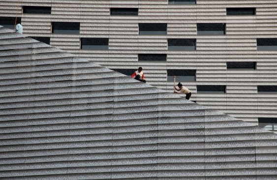 A stair leads up to the building far above ground.