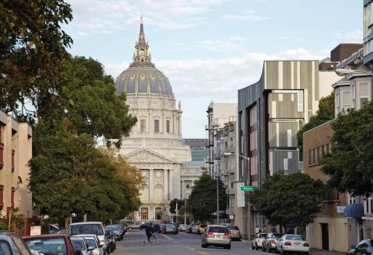 Drs. Julian and Raye Richardson Apartments on right, with San Francisco City Hall in background.