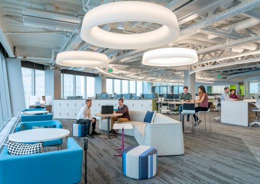 A touchdown space on the North end of the building features three 6’ diameter decorative pendant lights. 