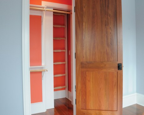 The secret ladder is concealed behind a pocket door on the back wall of the closet.  The children can access the playroom above via this ladder.