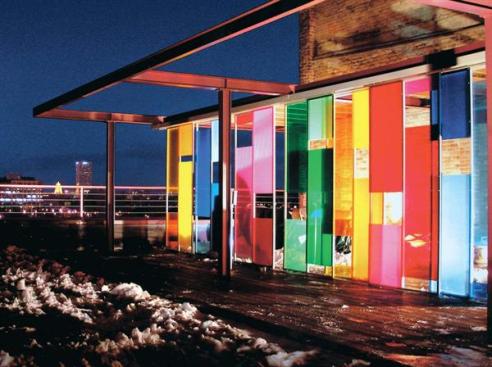 Made from cell-cast acrylic, the translucent 4-foot-by-8-foot wall panels on this rooftop dining pavilion work with a retractable canvas roof to provide a number of flexible environments.