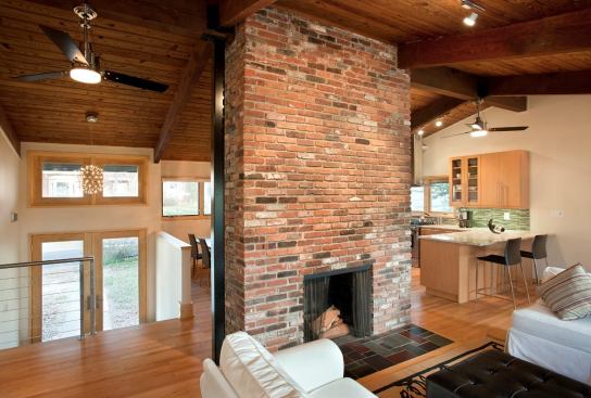 After: The new design’s open plan literally broke down barriers and fully exposed the ceiling that the homeowners loved so much.